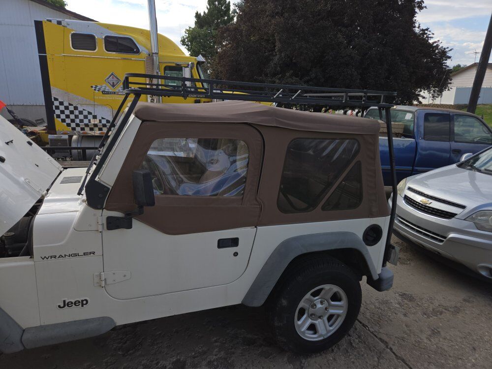 Luggage rack for a jeep wrangler