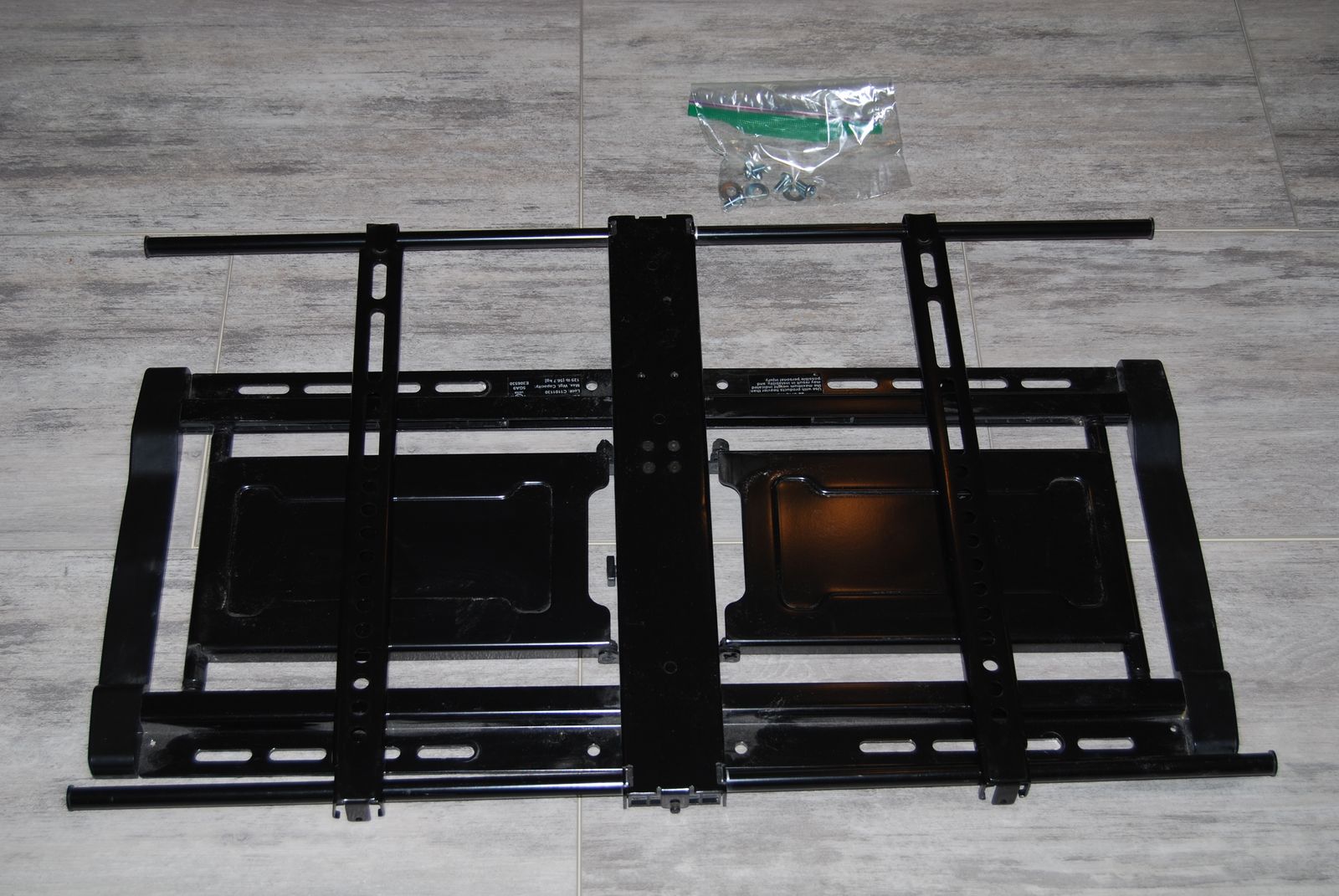 A TV wall mount it will work on a 48 or 55 in. tv up to 125 pounds