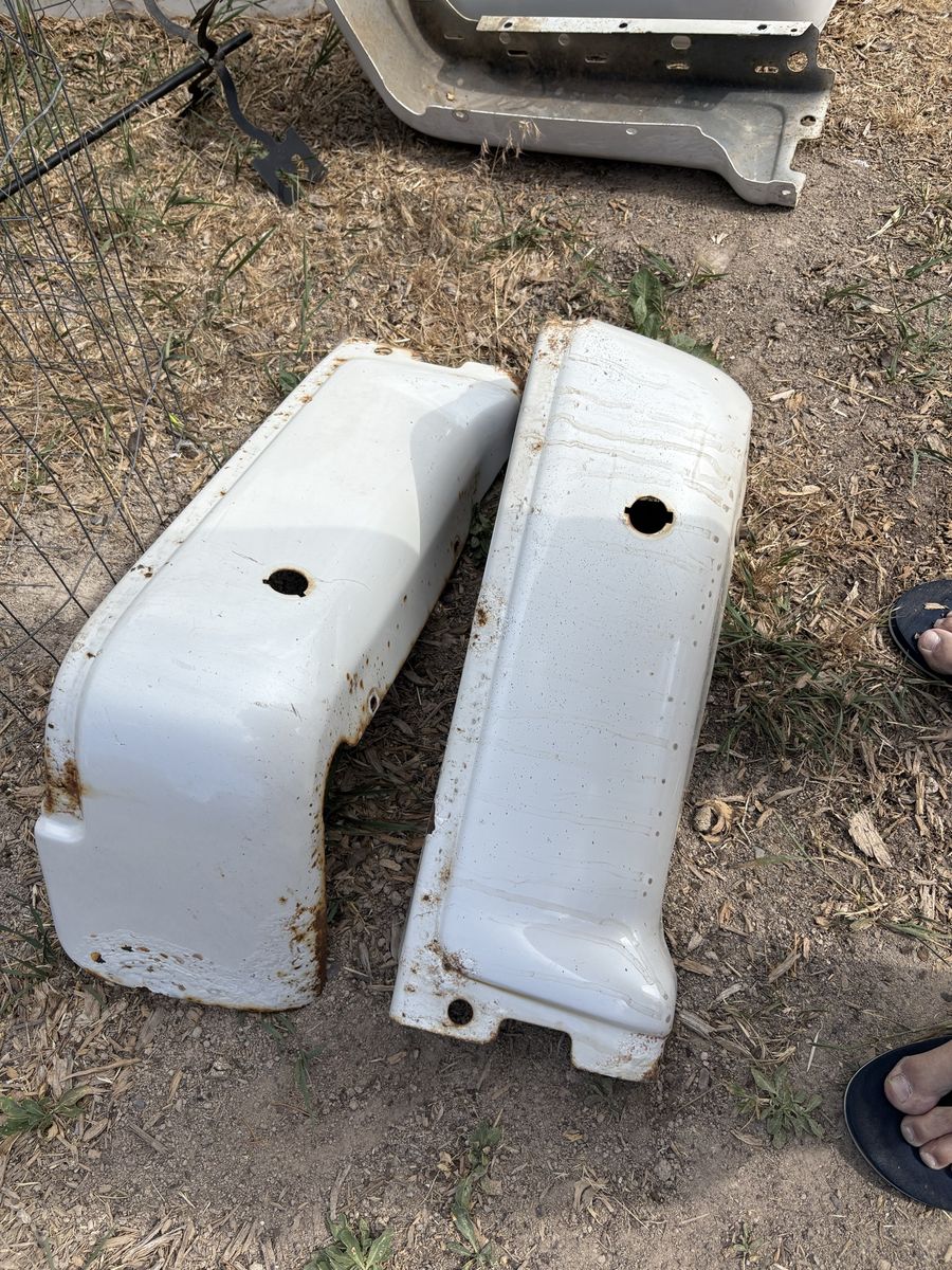 Rear bumpers pieces left and right for a 2012 F150 with holes for sensors