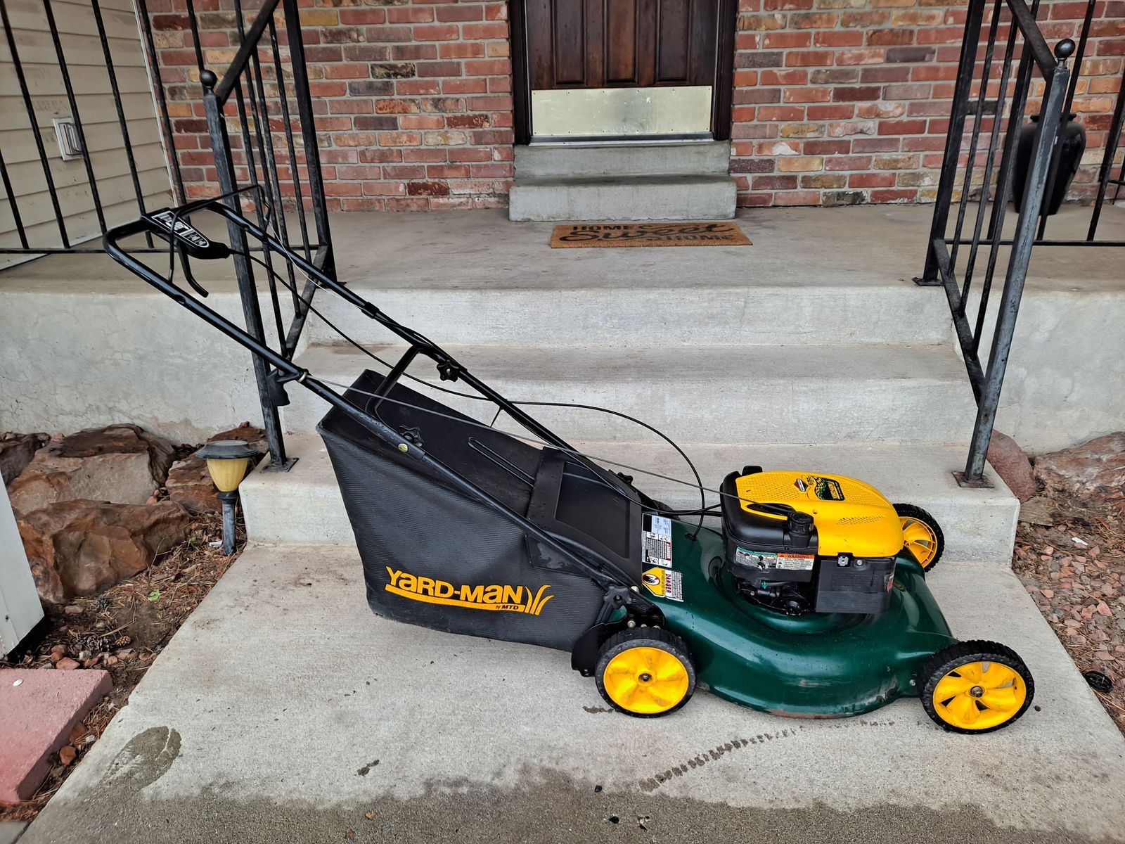 Yard Man rear wheel drive bagged mower, flawless