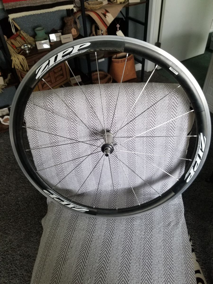 Older Zipp  carbon front wheel  700c