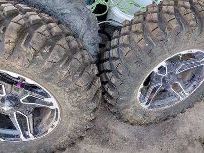 2 almost new tires 30x11r15