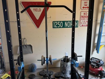 Power Cage, weights and bar.