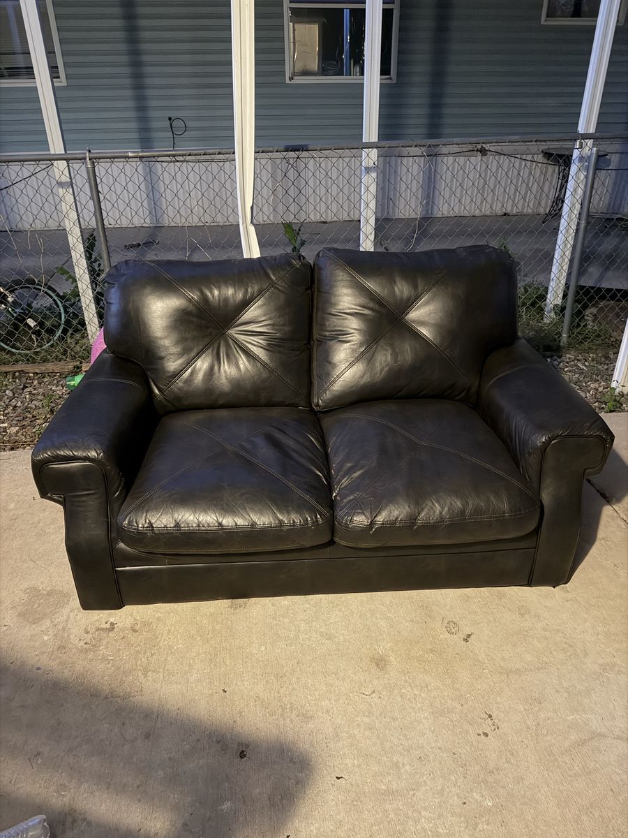 Dark brown leather chair/loveseat