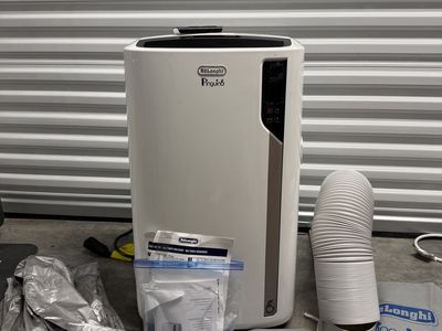 De'Longhi Pinguino 4-in-1 Portable AC & Heater (12,000 BTU) - Clean & Complete