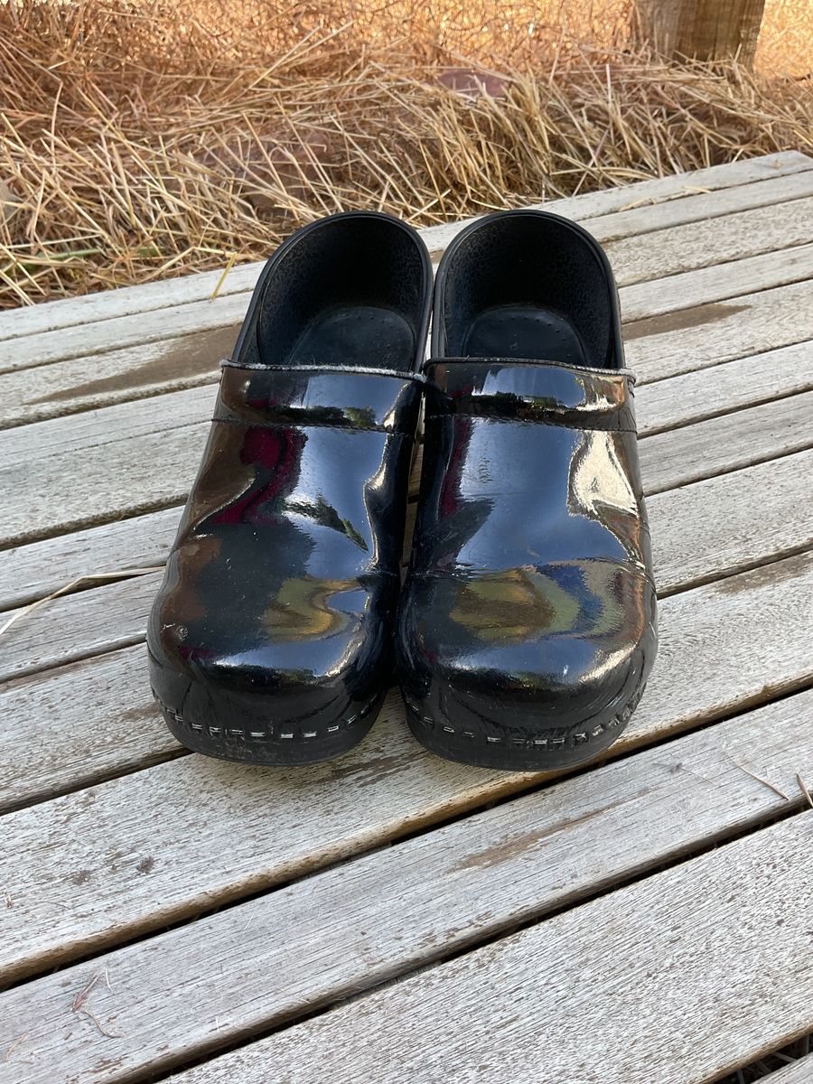 black glossy clogs