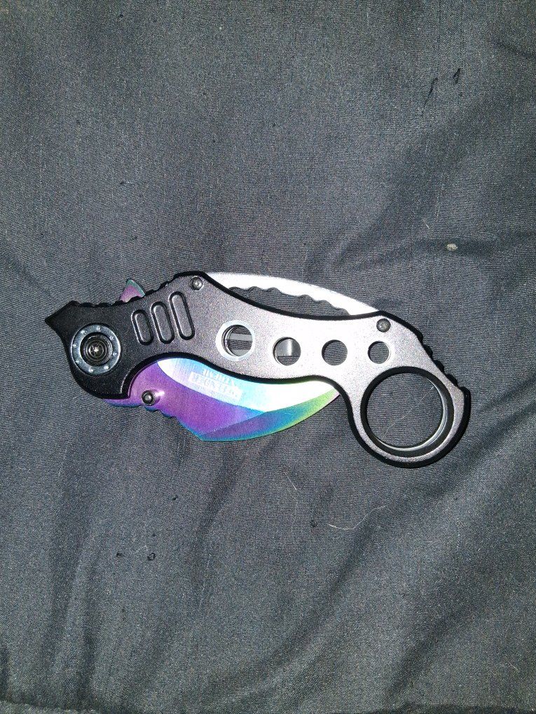 DEFENDER XTREME Rainbow Karambit Folding Knife with Finger Ring