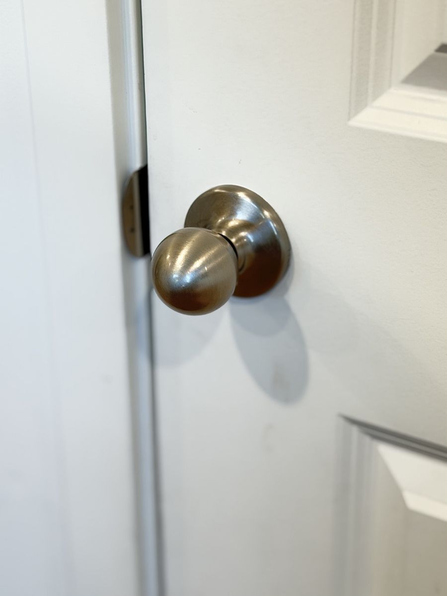 Kwikset Nickel door knobs and hinges