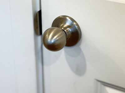 Kwikset Nickel door knobs and hinges