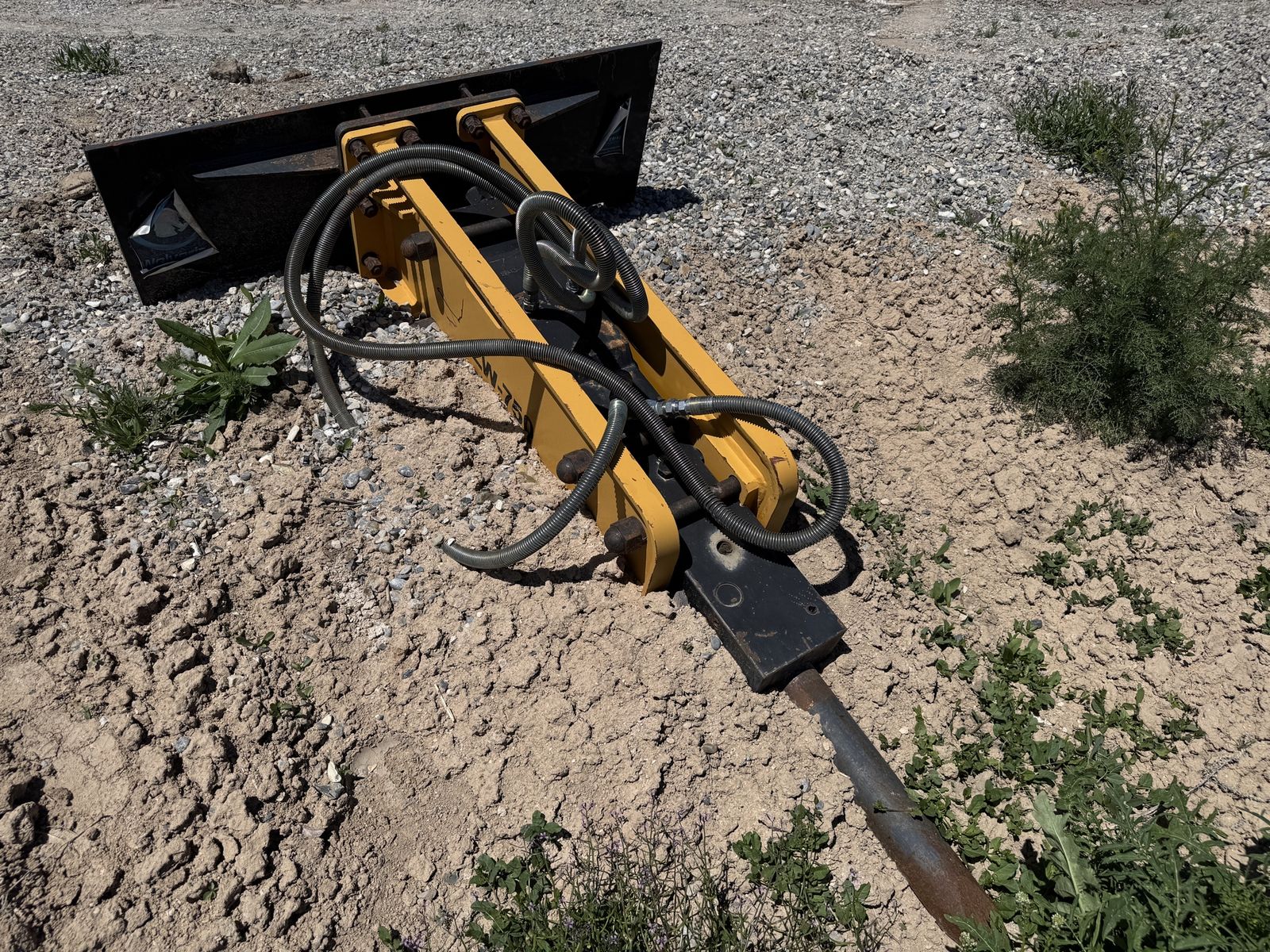 Skid Steer Attachments: Sweeper & Breaker