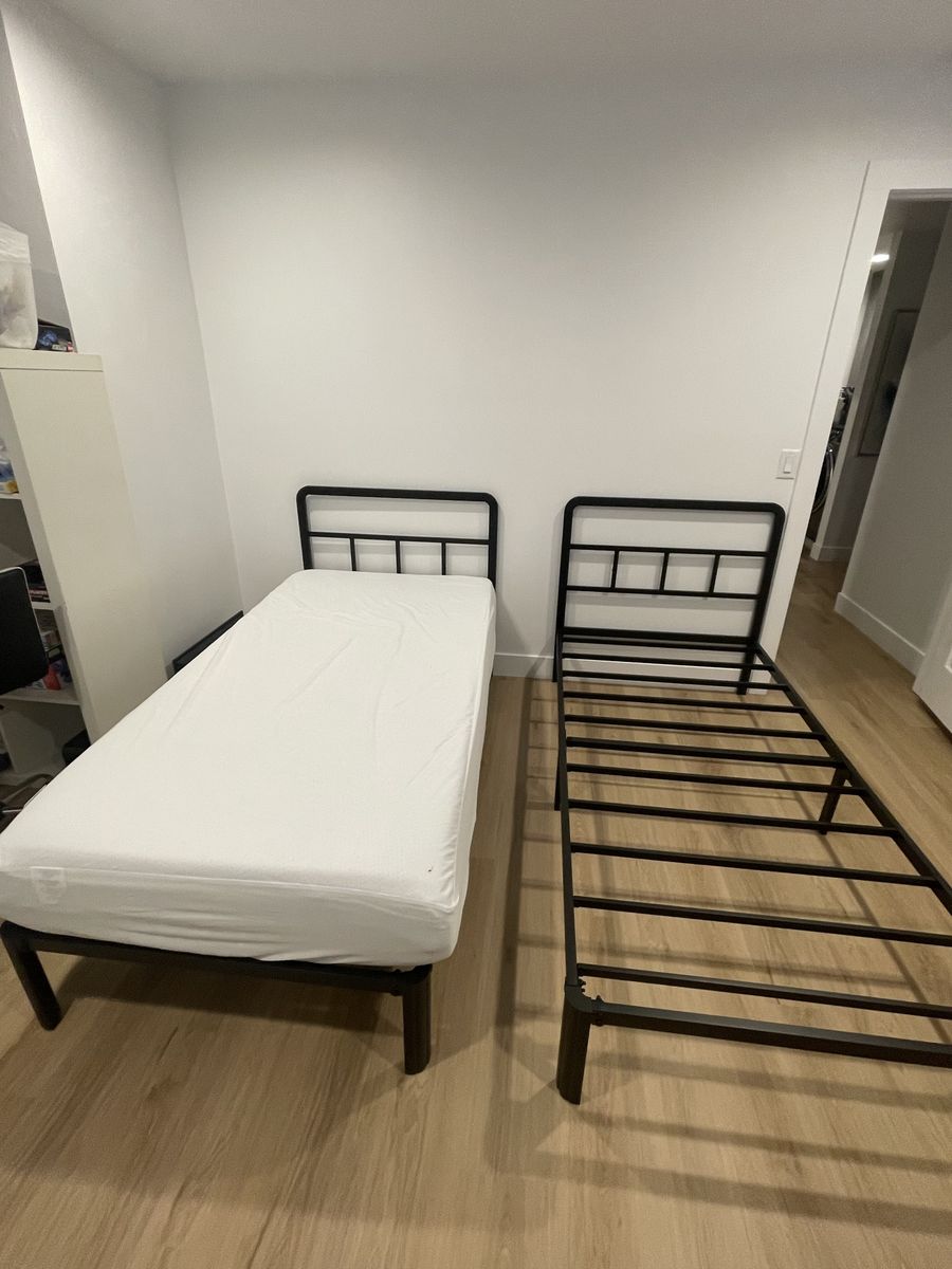 Two twin bed frames