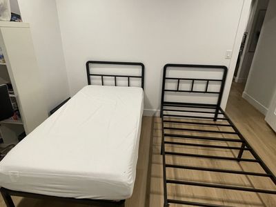Two twin bed frames