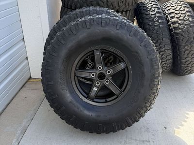 Rzr tires and rims.