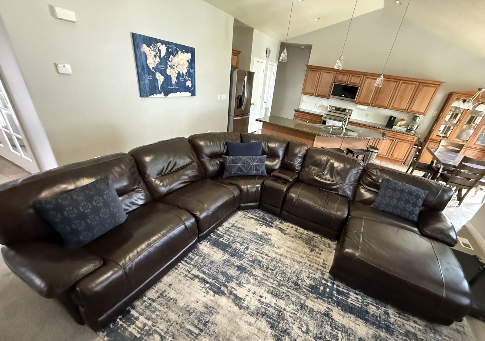 Comfortable 7-Piece Brown Leather Sectional with Recliners and Console with Cupholders