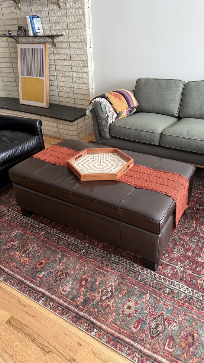 Faux leather ottoman w/ storage