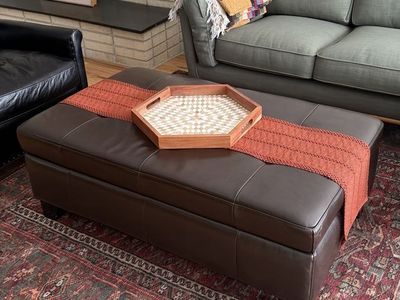 Faux leather ottoman w/ storage