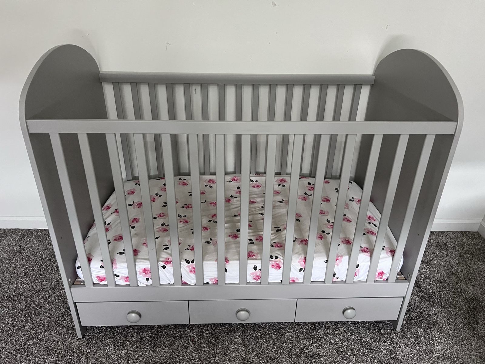 Modern IKEA crib with storage drawers