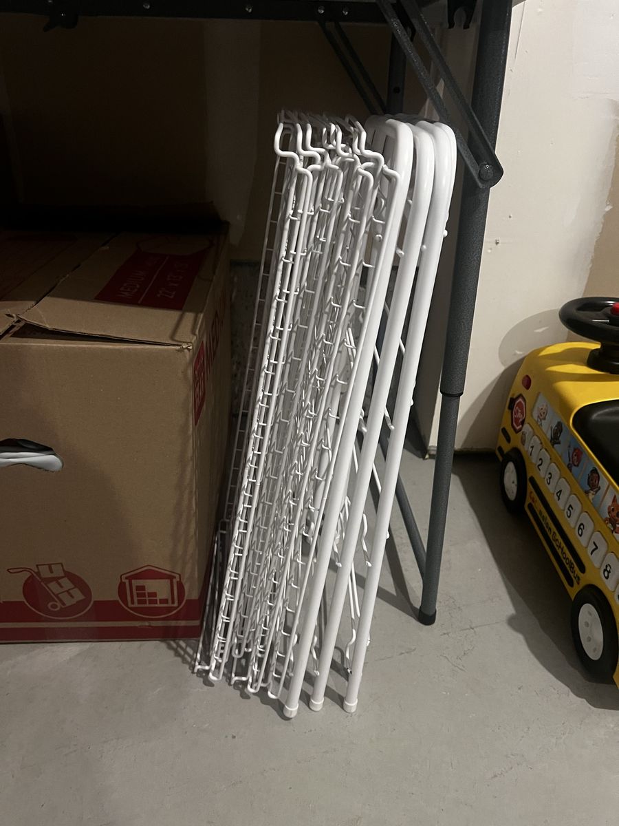 Two metal shoe racks