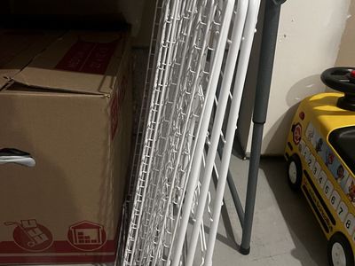 Two metal shoe racks