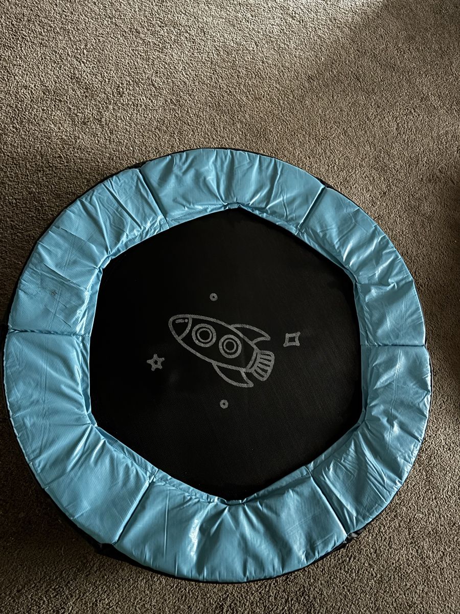 Kids Mini Trampoline Blue/Black with Rocket Design for Indoor/Outdoor Play has railing
