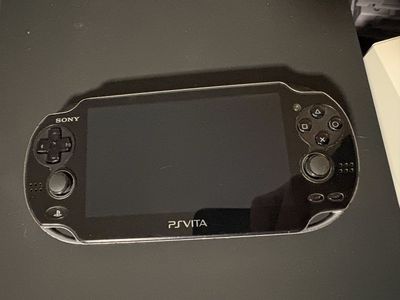PS Vita PCH 1001 OLED model + game PlayStation
