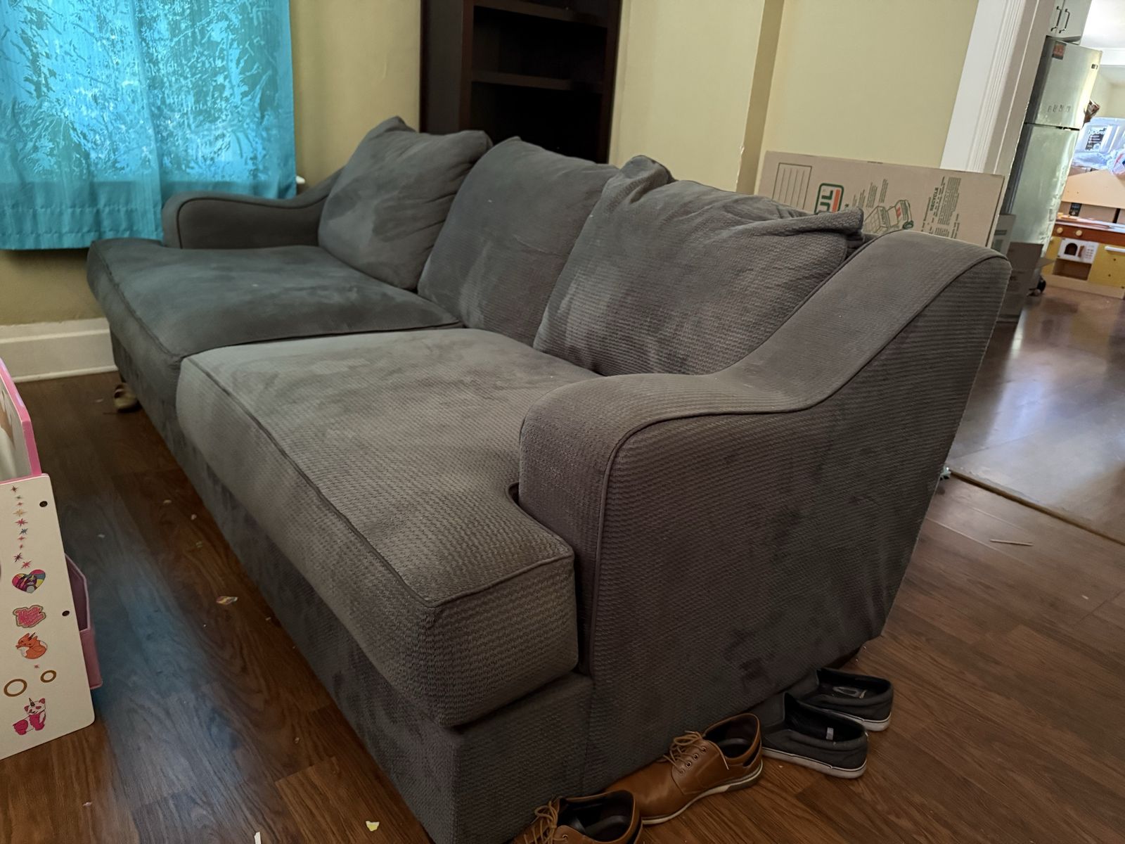 Grey couch - 8 ft long, 4 ft deep