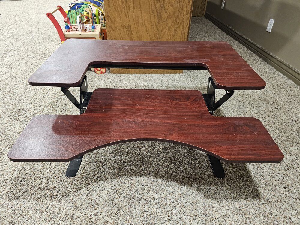 Adjustable standing desk table top