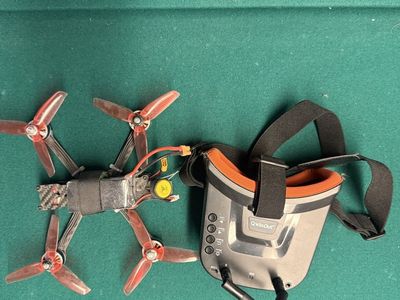 FPV Drone Quadcopter & QWinOut Goggles Set no battery charger I can find a controller to connect for an extra 50$ very nice!