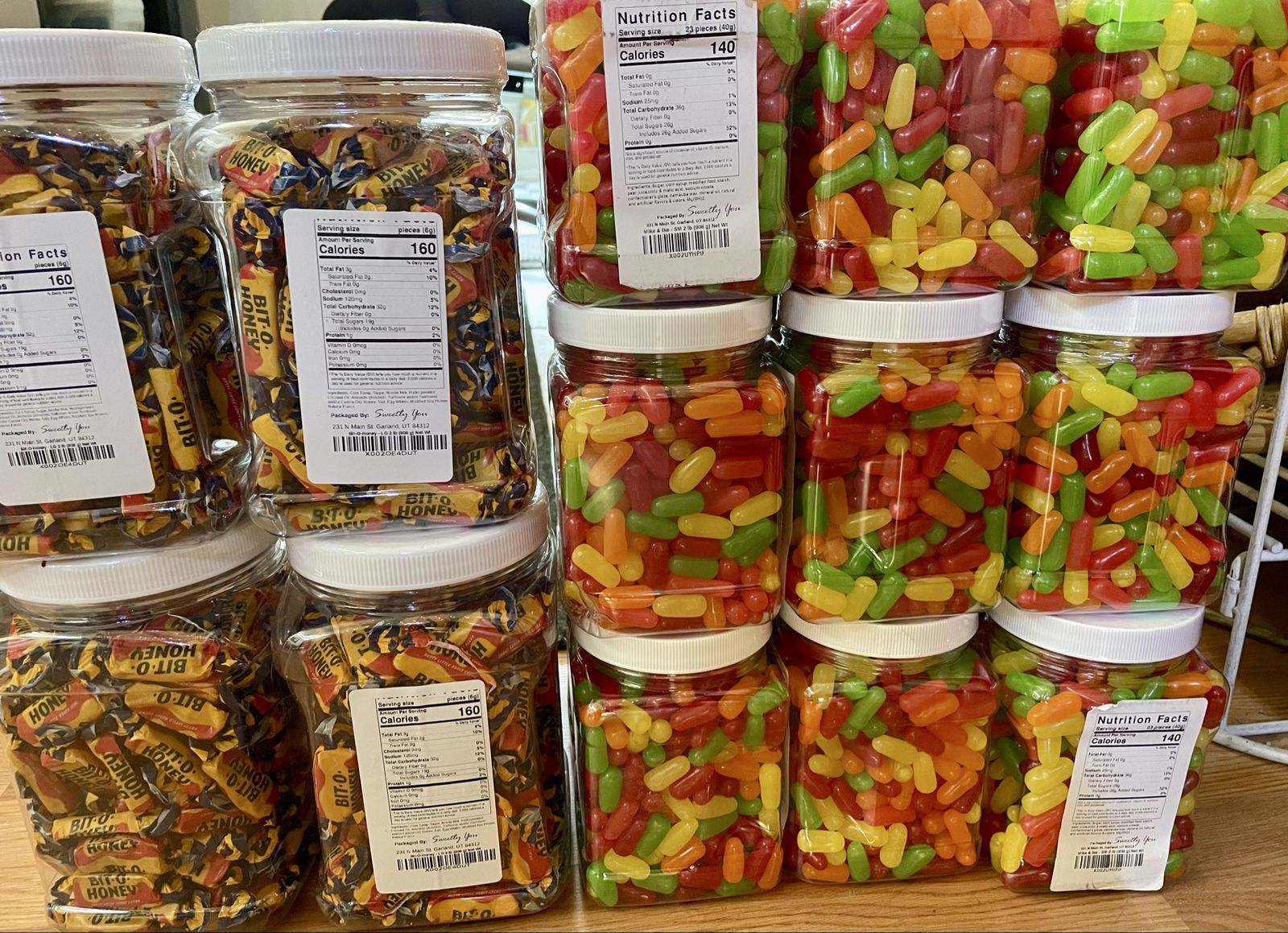 2lb Containers of candy Mike N Ike's And Bit O Hon