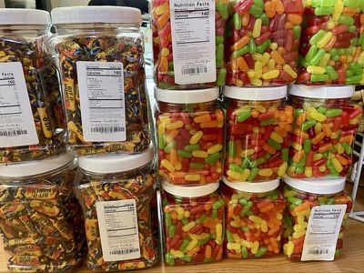 2lb Containers of candy Mike N Ike's And Bit O Hon