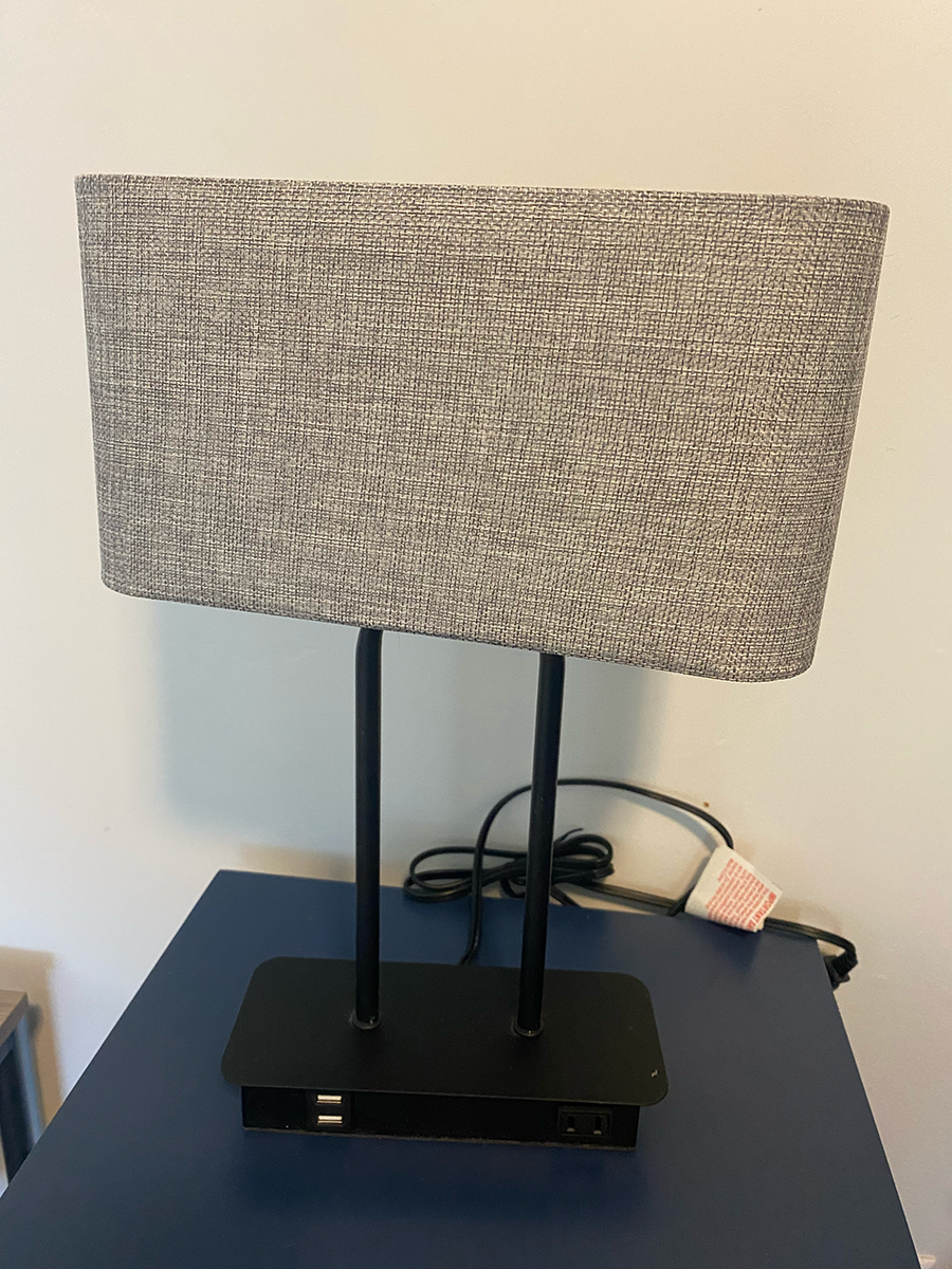 Touch control 3 way dimmable table lamp with 2 USB ports & 1 AC outlet.