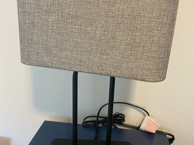 Touch control 3 way dimmable table lamp with 2 USB ports & 1 AC outlet.
