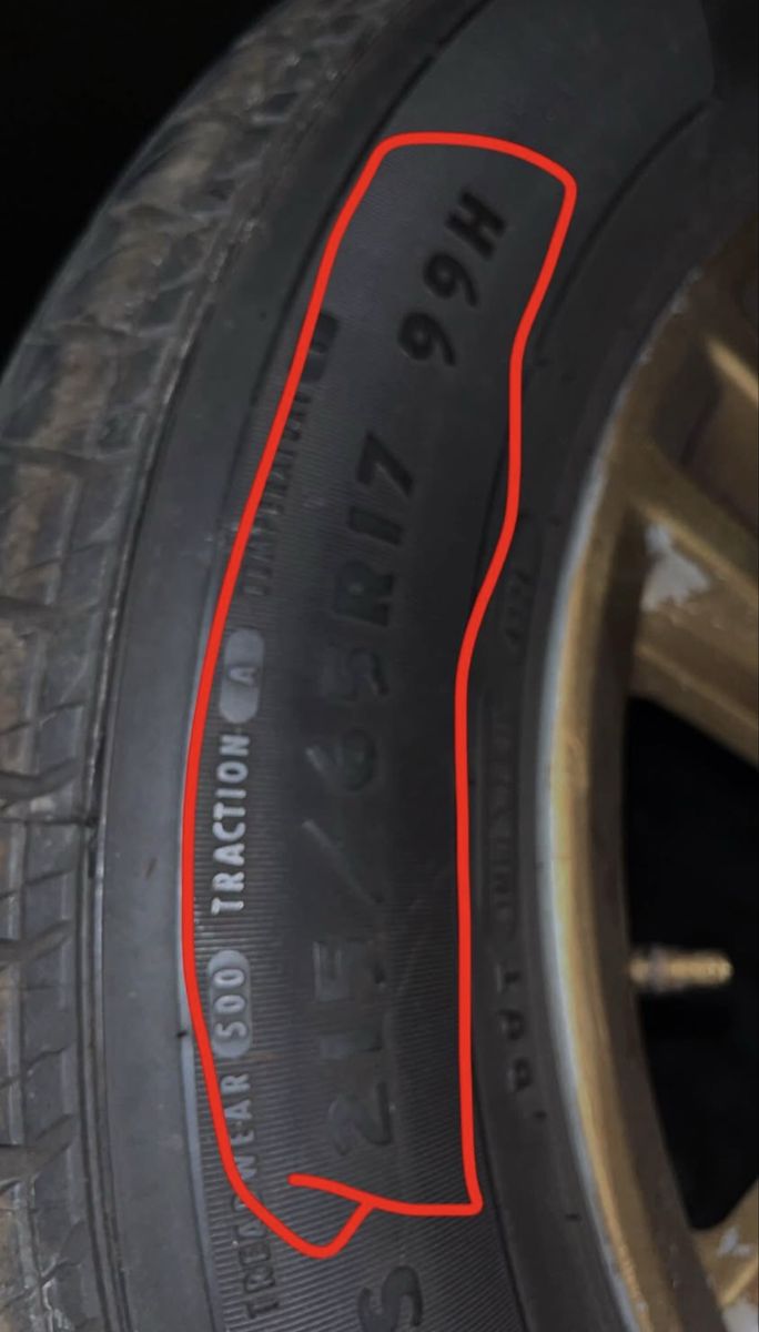 Douglas Touring Tire 215/65R17 99H on Gold Rims with Lug Nuts