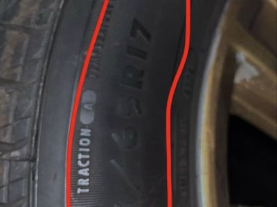 Douglas Touring Tire 215/65R17 99H on Gold Rims with Lug Nuts
