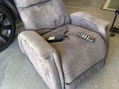 Zero gravity recliner w/ adjustable headrest, messages, and heater.