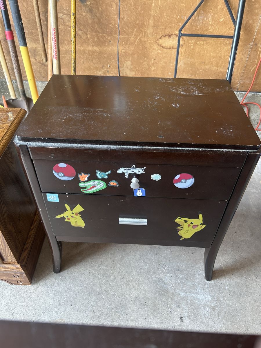 Dark Wood Two-Drawer Nightstand with Pikachu and Pokémon Stickers