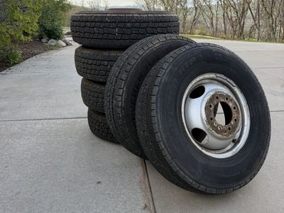 (7) 235/85R16 dually wheels and tires