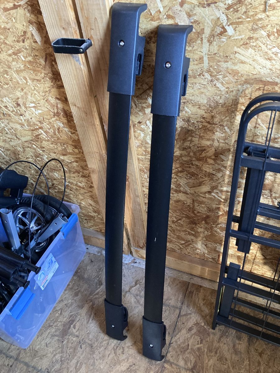 Cross bar roof rack rails