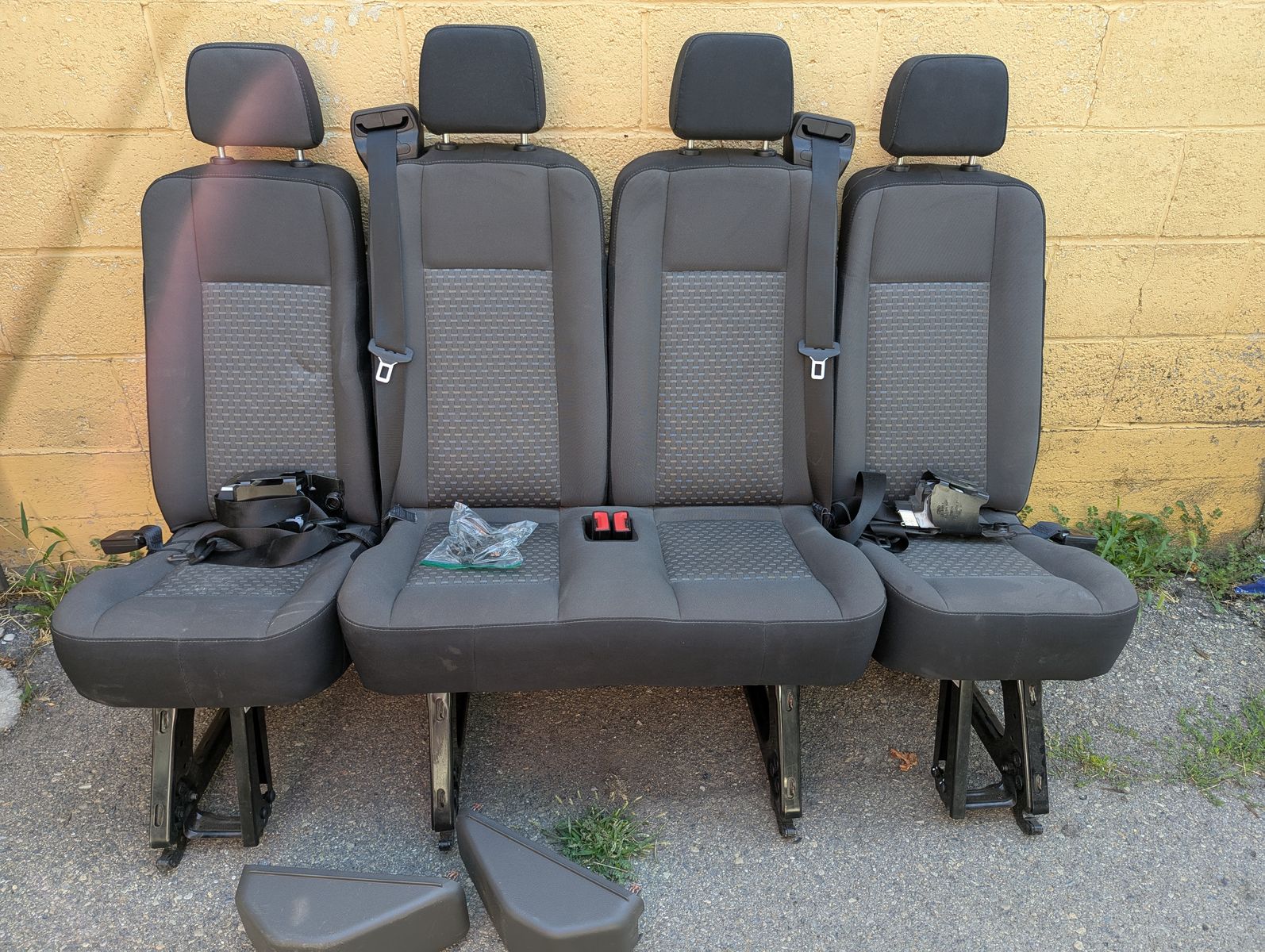 4 rear seats 2015- 2026  Ford Transit seats, complete with seat belts and harness.