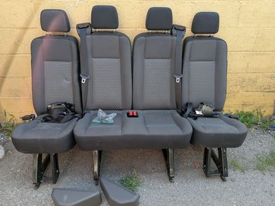4 rear seats 2015- 2026 Ford Transit seats, complete with seat belts and harness.
