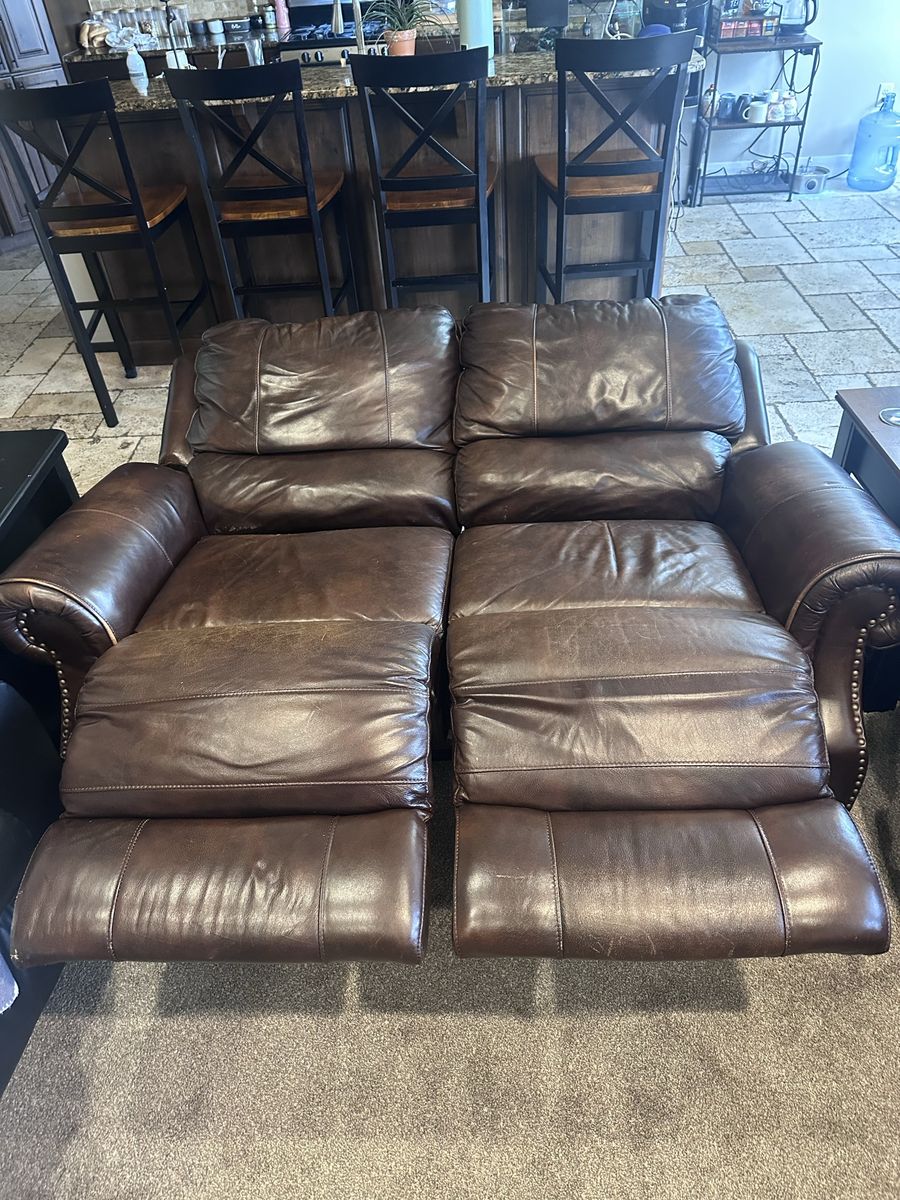 Brown Leather electric Reclining Loveseat