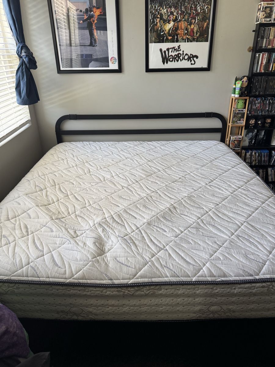 King mattress w/ box springs & metal frame.