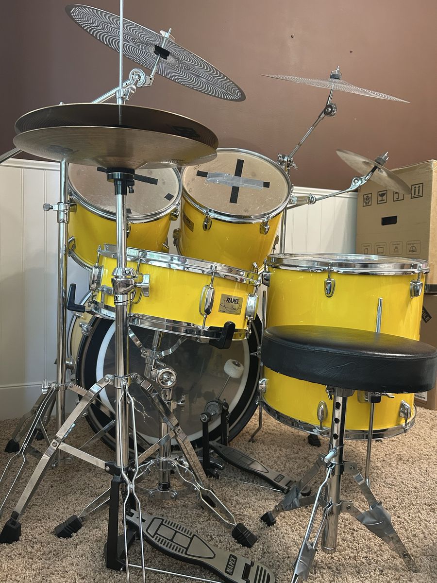 Yellow drum kit + cymbal stands