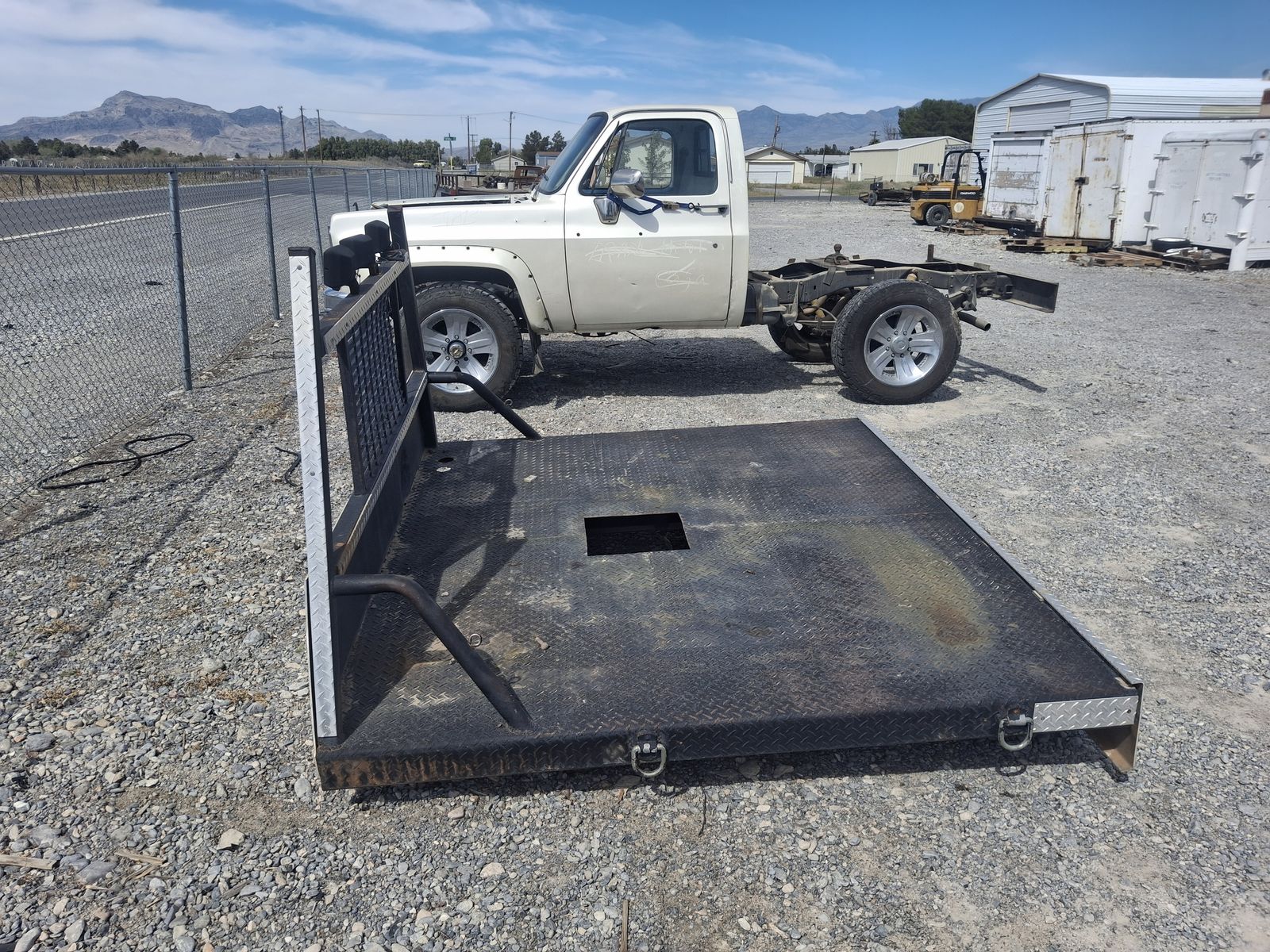 TRUCK FLATBED FITS A SHORT WHEEL BASE TRUCK.