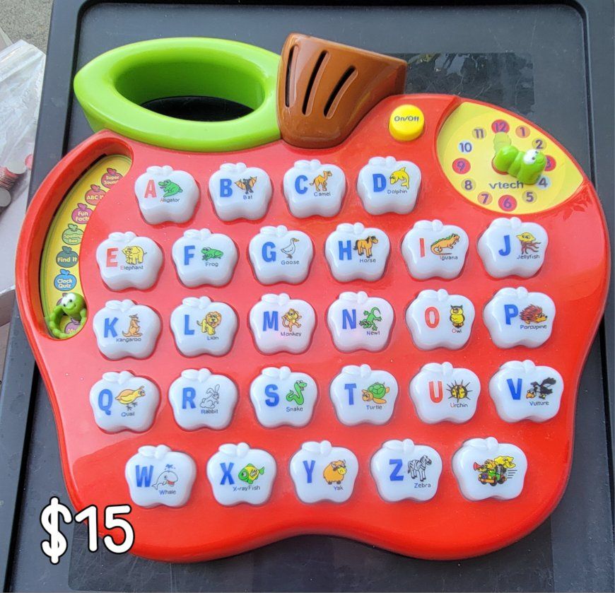 VTech Apple Alphabet, LeapFrog Fridge Phonics, Lakeshore Geometric Shapes, and Learning Resources Ta