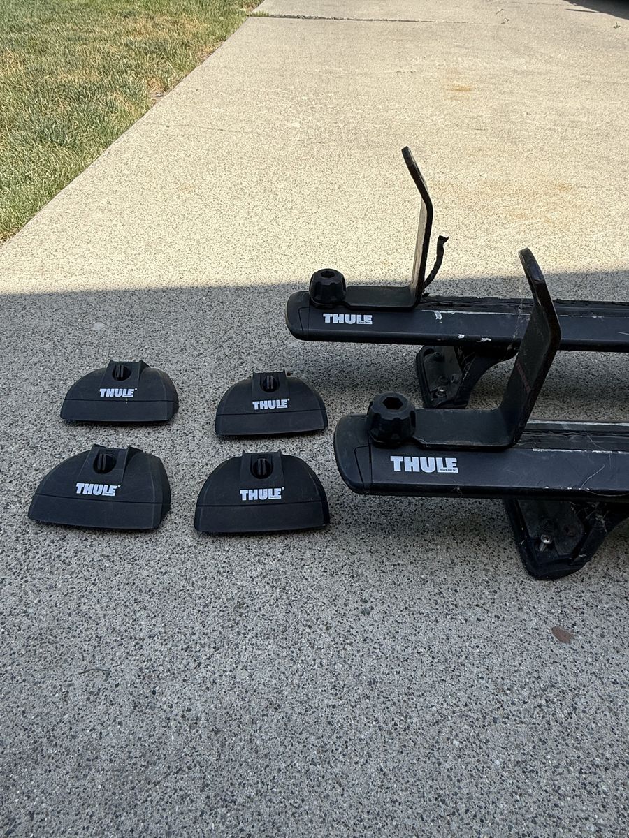 Thule Roof Rack Crossbars with Kayak / Canoe Holders and Foot Covers