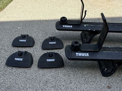 Thule Roof Rack Crossbars with Kayak / Canoe Holders and Foot Covers