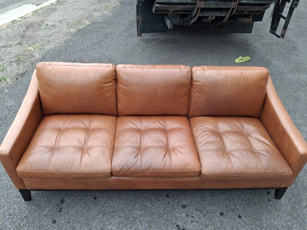 leather couch sofa and ottoman