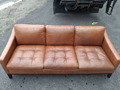 leather couch sofa and ottoman