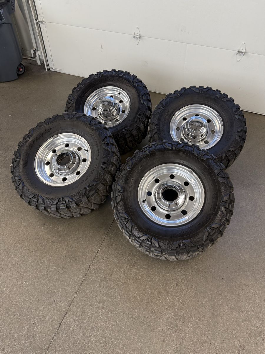 16in OEM 1997 f350 Alcoa wheels/ 305/70/16 nittos